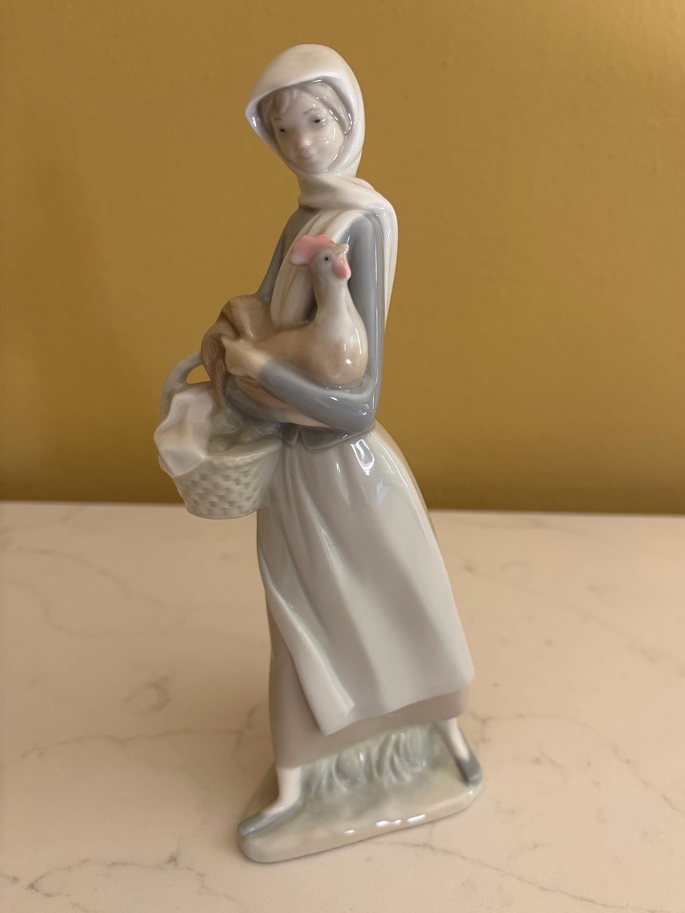 Lladro Porcelain Woman Figurine in White and Gray with Basket and Dove